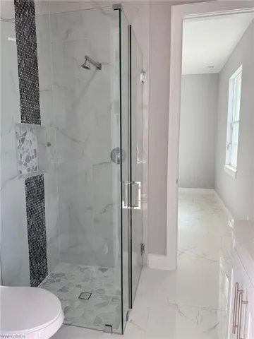 Third Bathroom with Access to the Screened Lanai.