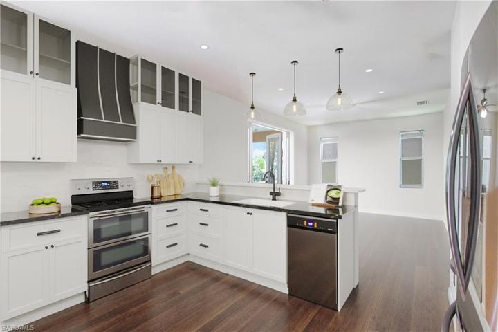 Photo has been reality renovated to showcase the possibility of the kitchen. Design services included with purchase!