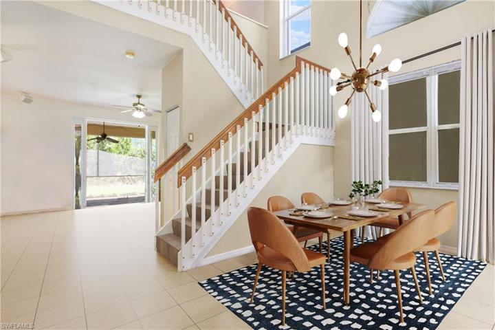 Photo has been reality renovated to showcase the possibility of the dining room. Design services included with purchase!