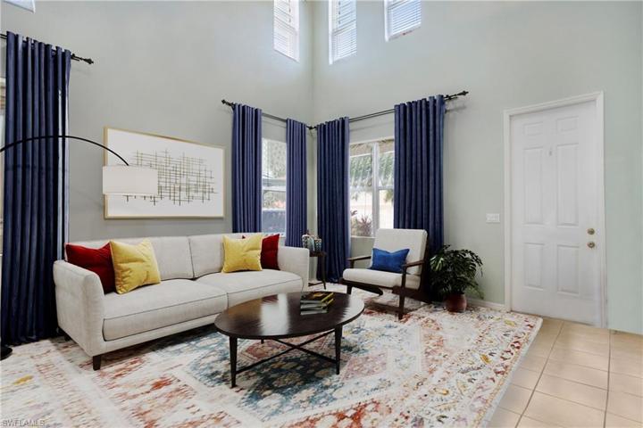 Photo has been reality renovated to showcase the possibility of the living room. Design services included with purchase!