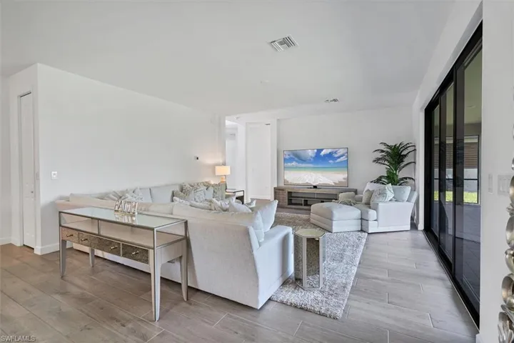 Living area with light wood-style floors