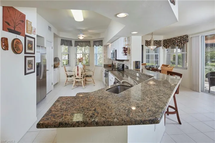 Spacious kitchen with plenty of room for meal preparation.