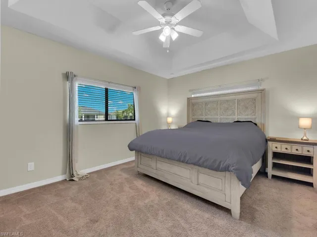 Dining area featuring wood finished floors, healthy amount of natural light, vaulted ceiling, and recessed lighting