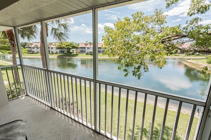 Balcony with a water view and a wealth of natural light