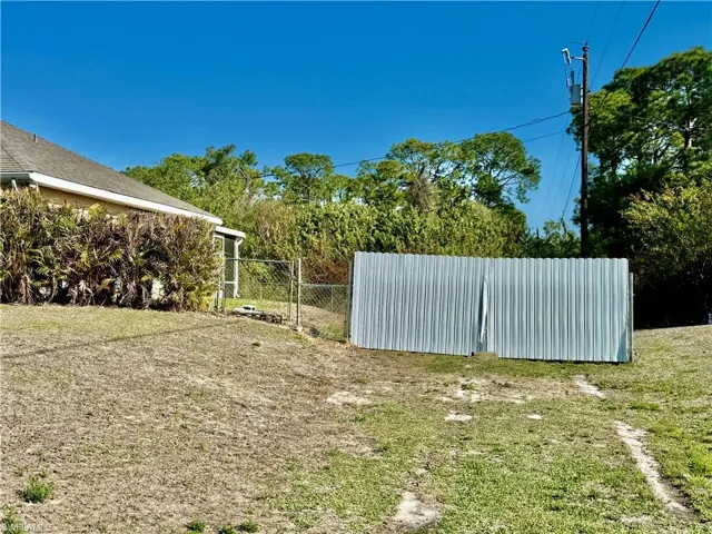 Double gate to backyard.