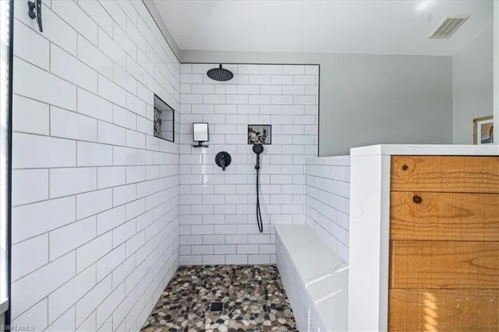 Bathroom with tiled shower