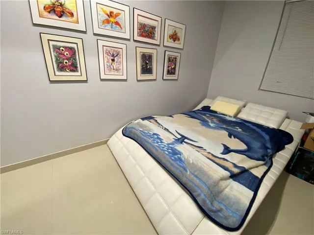 Bedroom with tile patterned floors