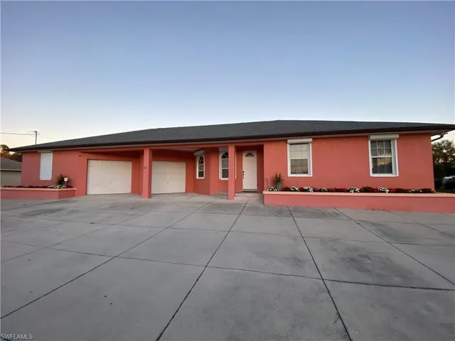 Ranch-style house with a garage