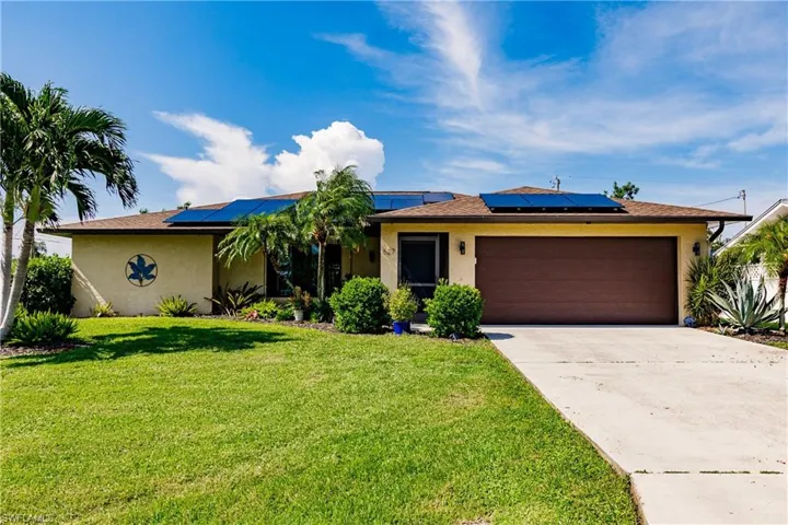 Gorgeous home on large corner homesite.  New roof, solar panels, great landscape, rear yard screened in pool with huge lanai.  Great place.
