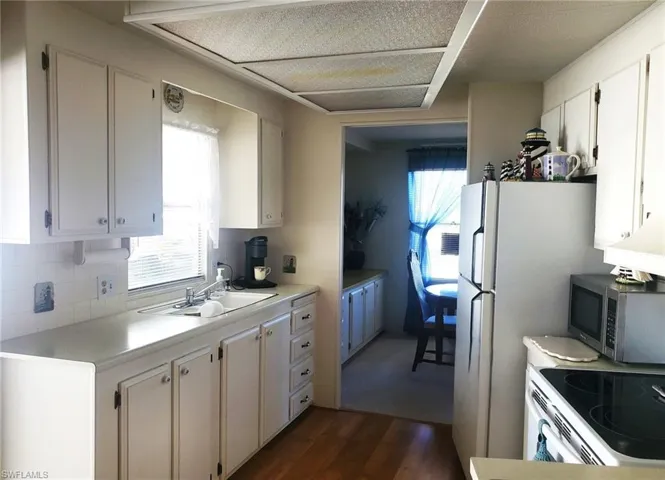 Kitchen with view to dining room.