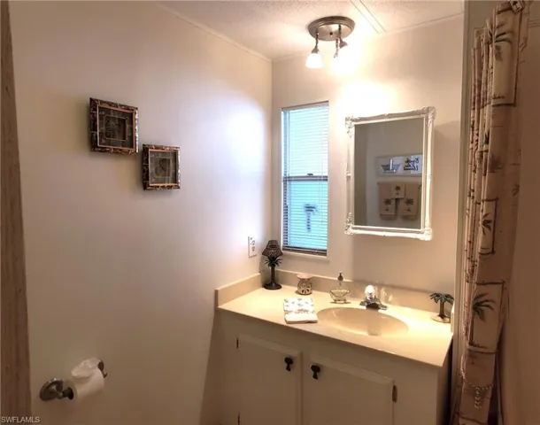 Second bathroom features a shower/tub combo