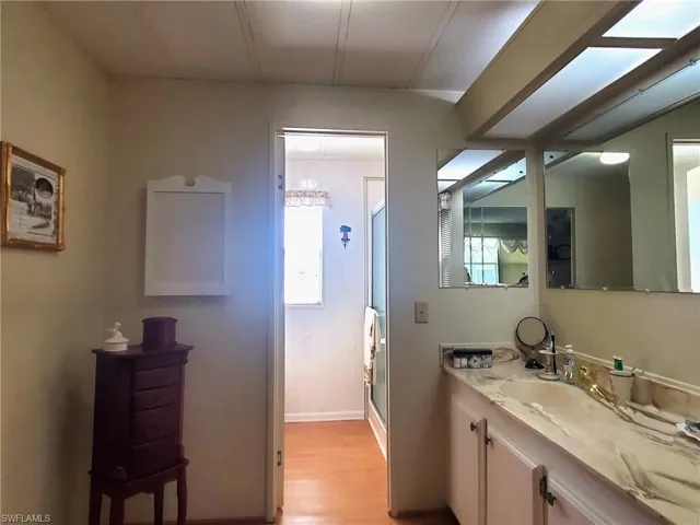 Master Bathroom  features lots of  counter-space, a separate shower, and a walk-in closet.