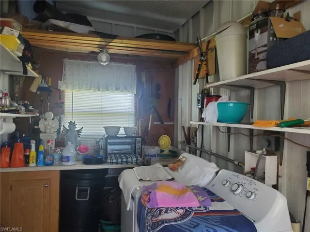 The breezeway shed includes the washer and dryer and lots of storage space.
