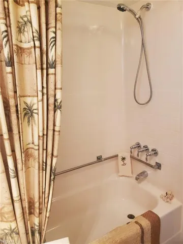 Second bathroom features a shower/tub combo.