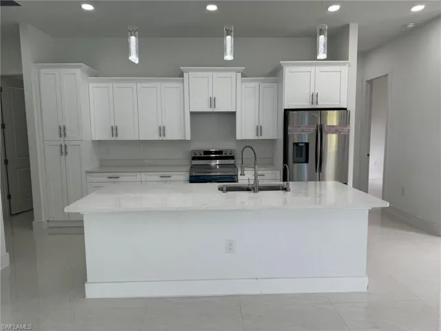 2810  9th W ST, Lehigh Acres, FL 33971