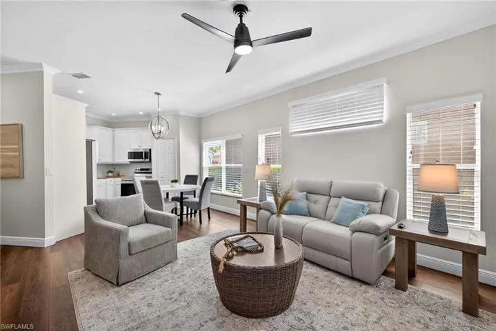 All new flooring throughout, updated paint, roof replaced in 2022, hot water heater, electric panel, and HVAC all updated, with no flooding ever.