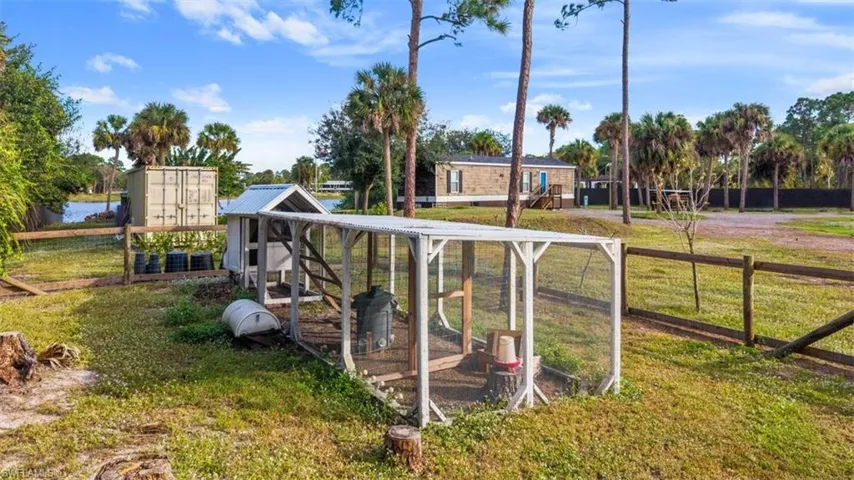 View of yard featuring exterior structure and an outdoor structure
