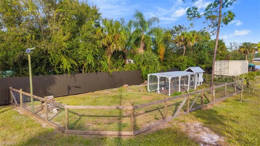 View of yard featuring exterior structure and an outdoor structure