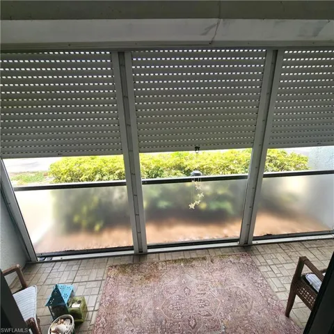 Elec Storm Shutter On Porch - Partly Down