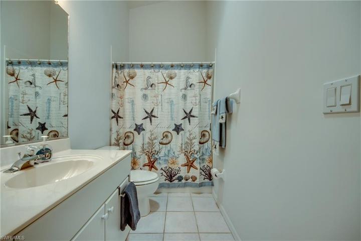Guest Bath offers a Solatub making the room light and bright.