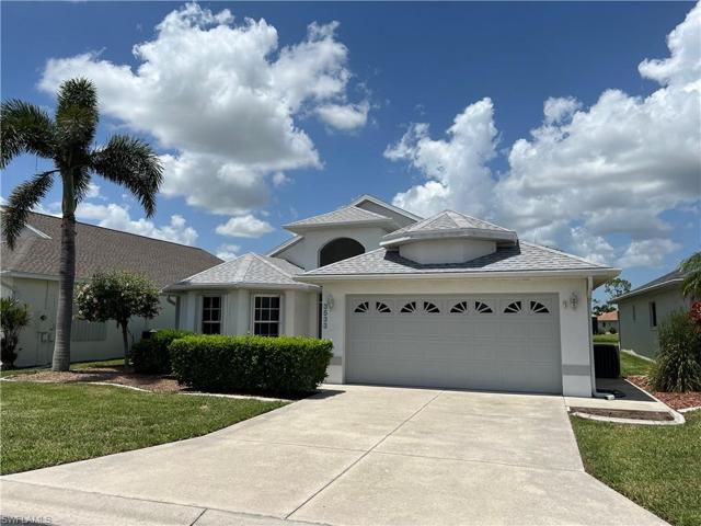 Nicely landscaped with a driveway long + wide enough to accommodate4 cars.