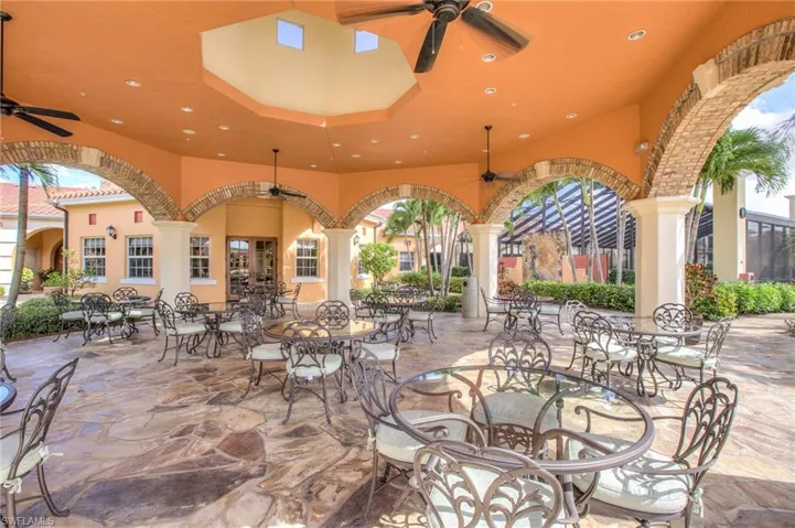 View of patio / terrace with a ceiling fan and outdoor dining space