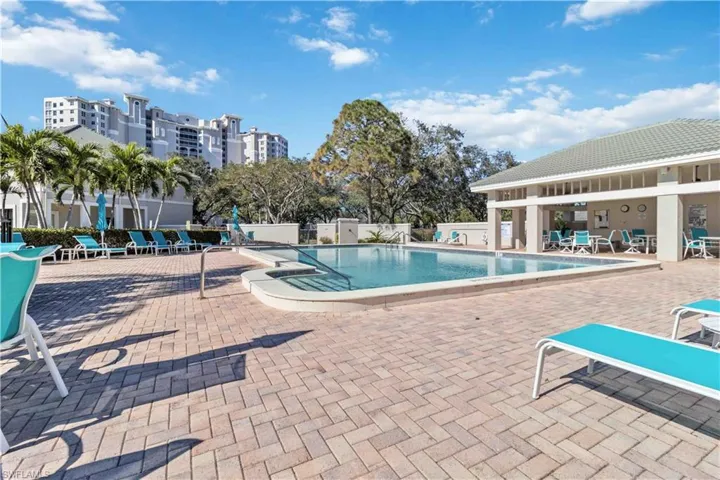Community pool featuring a patio area