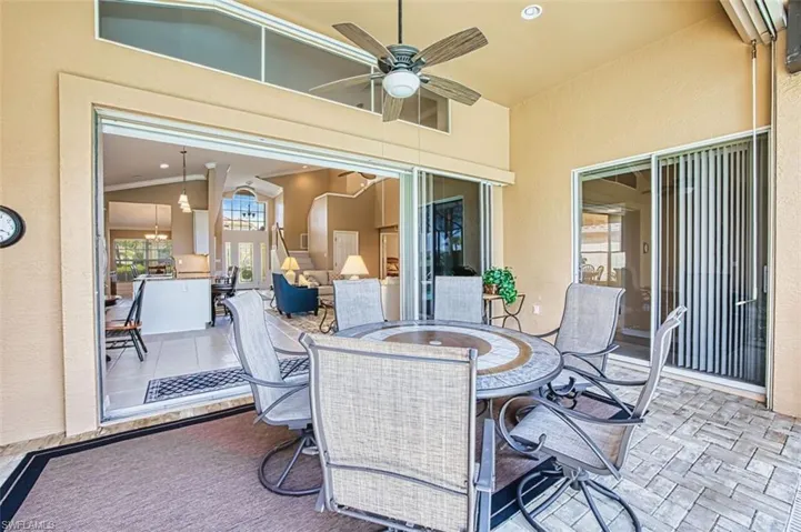 View of patio / terrace with outdoor dining space and ceiling fan