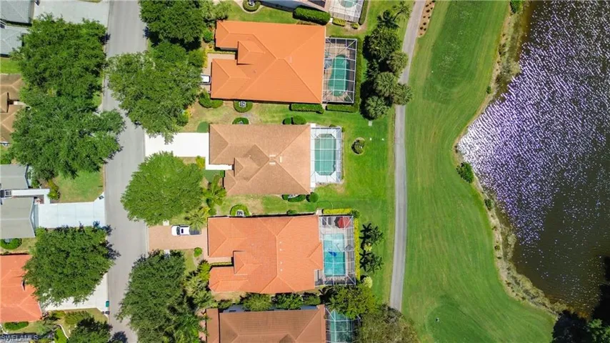 The one in the middle with the lighter roof is the one for sale.