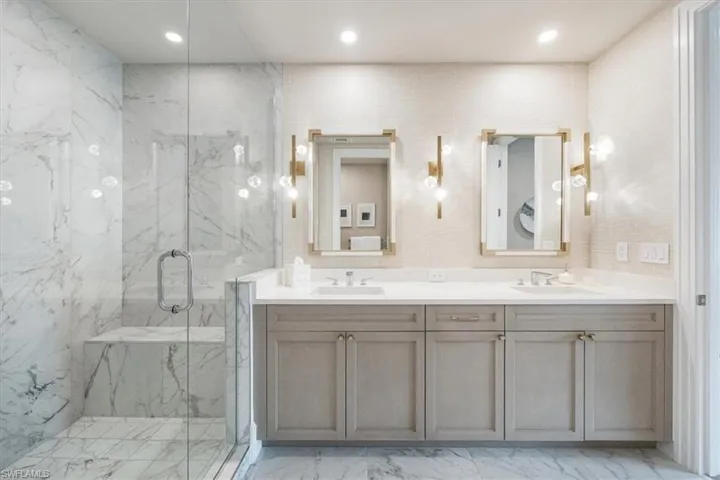 Guest Suite 1 Bathroom with dual vanity and water closet