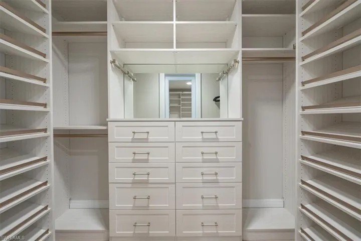 One of 2 Custom Closets in Primary Suite