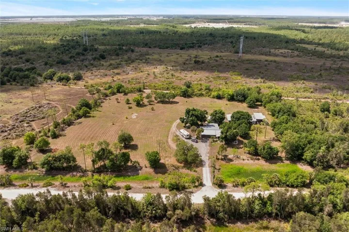 Aerial overview of property's location featuring rural landscape