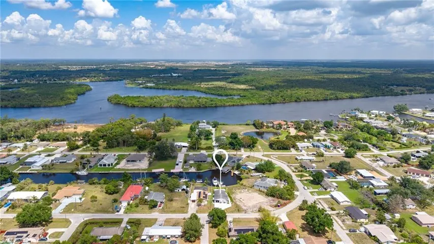 Bird's eye view with a residential view and a water view