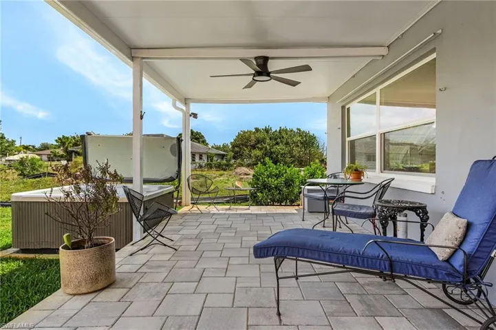 View of patio with a ceiling fan