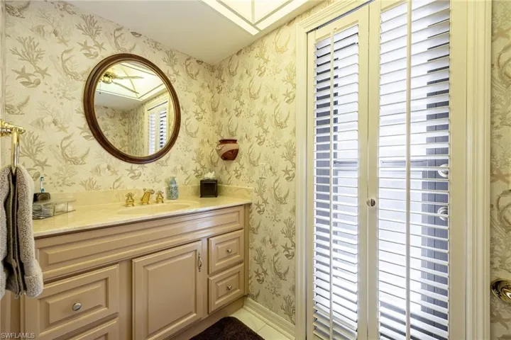 Guest Bathroom/ Pool Bath featuring vanity