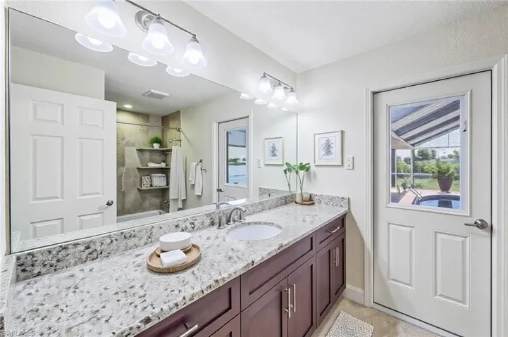 Bathroom with visible vents and vanity
