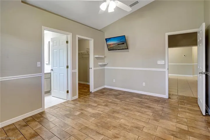 Guest suite 1 with en suite bathroom and walk-in closet