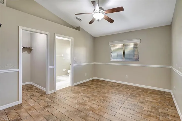 Guest suite 2 with en suite bathroom and walk-in closet