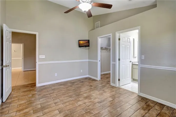 Guest suite 2 with en suite bathroom and walk-in closet