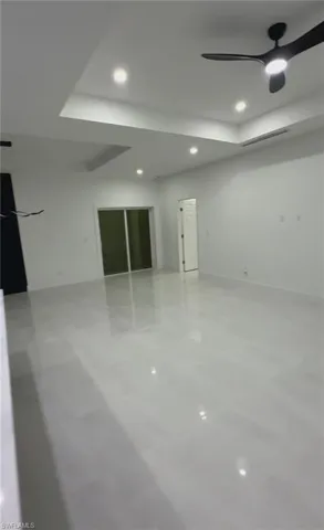 Unfurnished room with recessed lighting and a ceiling fan