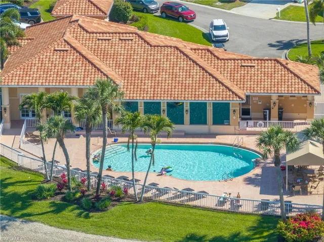 Community pool featuring a patio area
