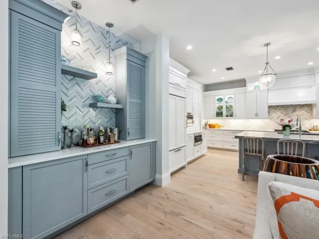 Bar with separate beverage cooler and ice maker