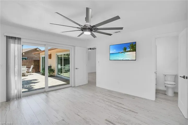 Spare room featuring ceiling fan and light hardwood / wood-style floors