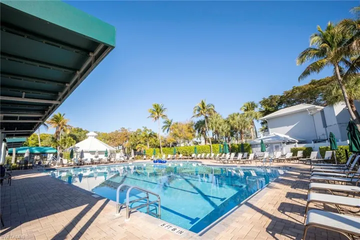 Community pool featuring a patio area