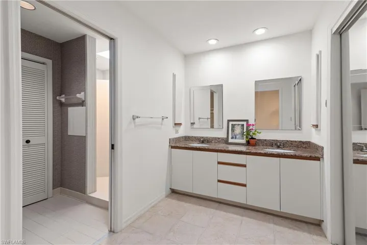 Large master Bathroom master shower. Separate and private vanity area.