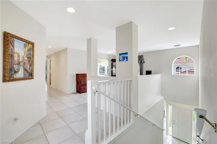 Entry hall and landing where 2200 sq. feet of single level living space abounds.