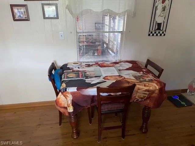 Dining space featuring wood finished floors