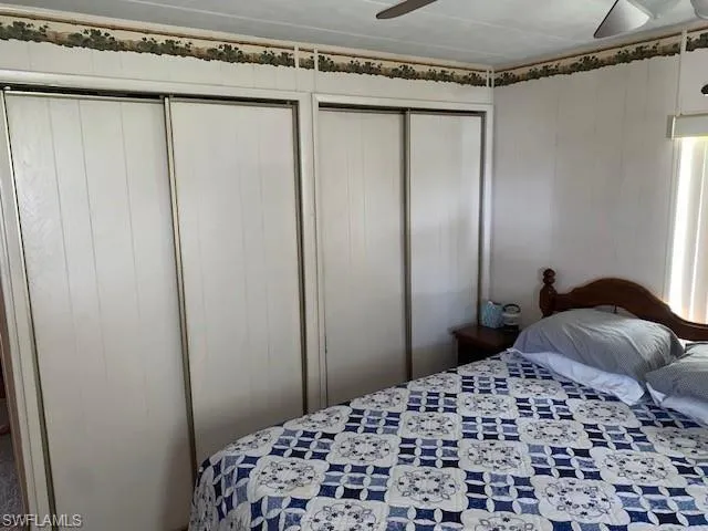 Bedroom featuring two closets