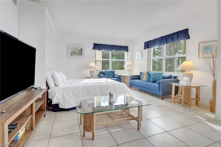 Bedroom with light tile patterned floors