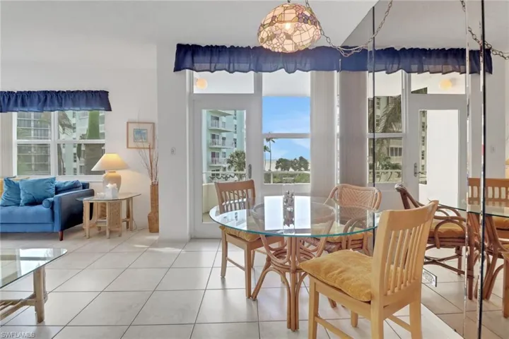 Dining room featuring light tile patterned floors